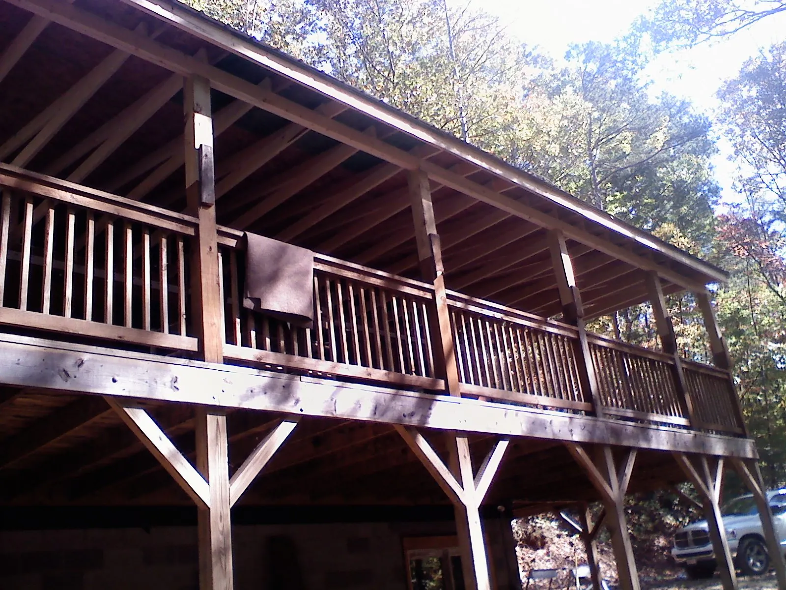 Timber framing under a new elevated porch and deck — Roof Leak Repair in West Decatur by Roofing Brothers